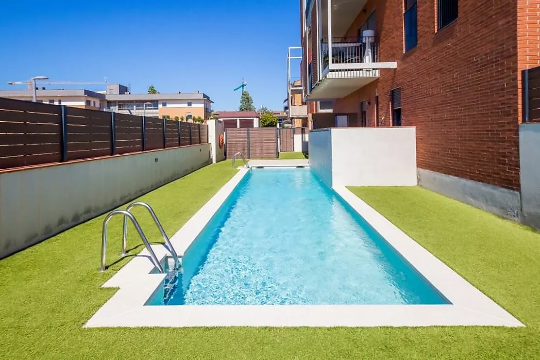 Impresionante planta baja con gran jardín privado de 128 m² y piscina comunitaria