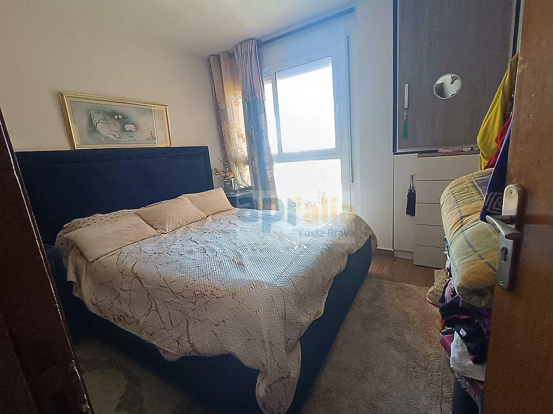 Appartement avec terrasse, ascenseur et parking.